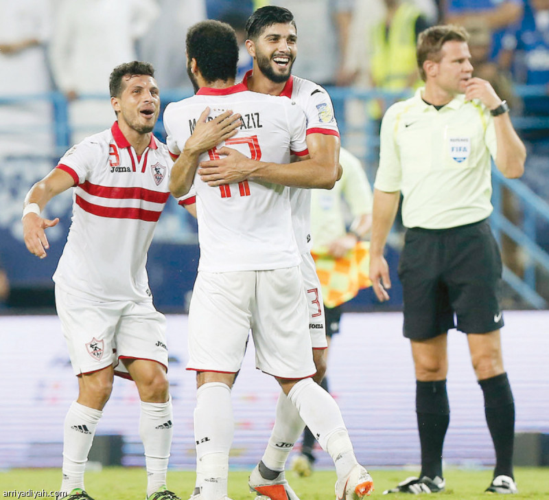 صورة التقطت أمس للثلاثي فرجاني ساسي ومحمد عبد العزيز وطارق حامد لاعبي فريق الزمالك يحتفلون بالفوز على الهلال