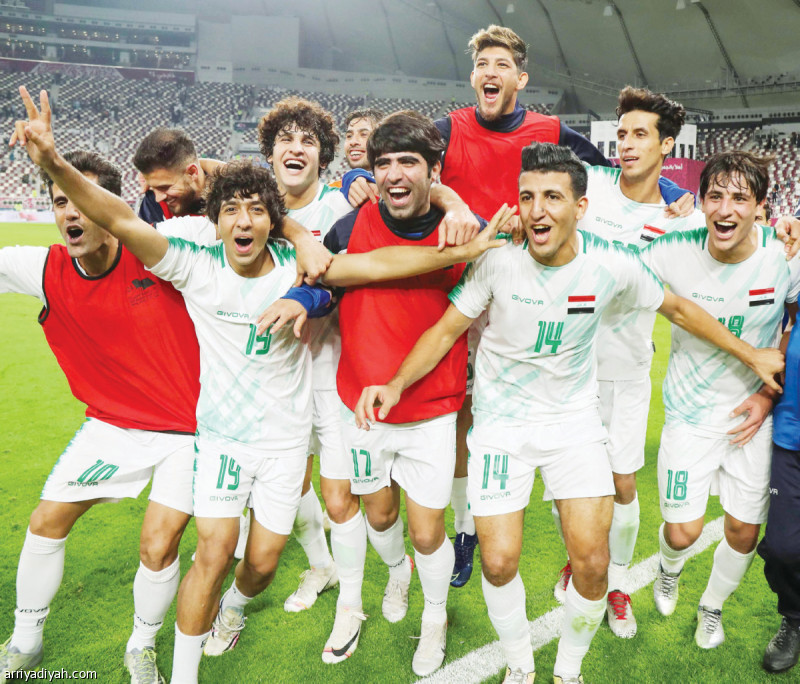 صورة التقطت أمس من فرحة لاعبي المنتخب العراقي بالفوز على قطر في افتتاح خليجي 24 (الفرنسية)