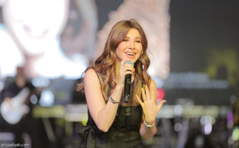 صورة التقطت للفنانة نانسي عجرم في إحدى حفلاتها الغنائية(أرشيفية)